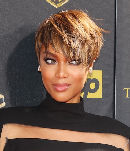 Tyra Banks wears choppy bangs on thin hair at the 42nd Annual Daytime Emmy Awards in 2015.