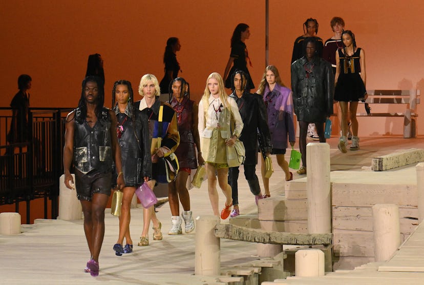 Lil Was X and models walk the runway during the Coach Spring 2023 fashion show.