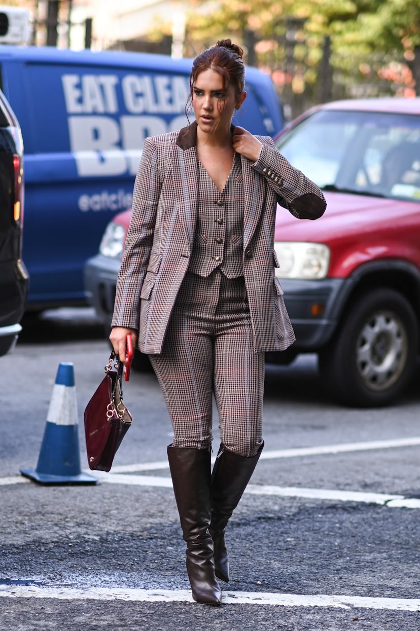 Tinx in a brown plaid suit at New York Fashion Week.