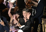 US actress Christina Ricci (L) and husband Mark Hampton wave at the start of the 74th Emmy Awards at...