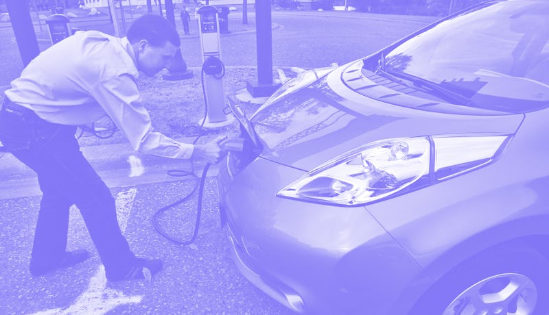 Jukka Kukkonen, of St. Paul, charged his Nissan Leaf all-electric car at a chargining station at the...