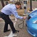 Jukka Kukkonen, of St. Paul, charged his Nissan Leaf all-electric car at a chargining station at the...