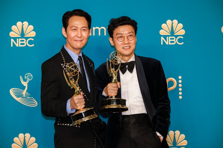 Squid Game star Lee Jung-jae and director/showrunner Hwang Dong-hyuk show off their Emmys. 