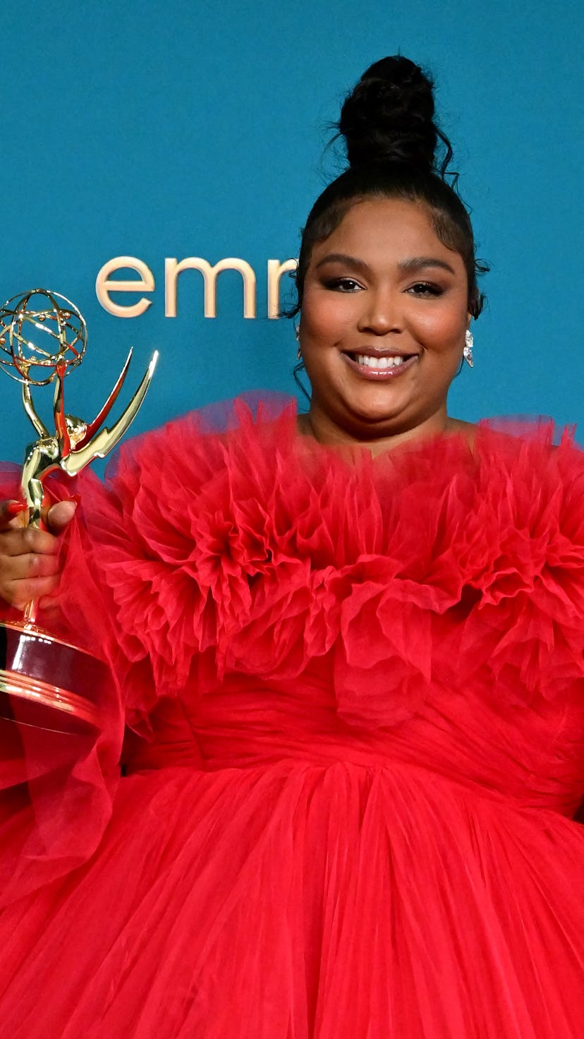 US singer-songwriter Lizzo poses with the Emmy for Outstanding Competition Program for "Lizzo's Watc...