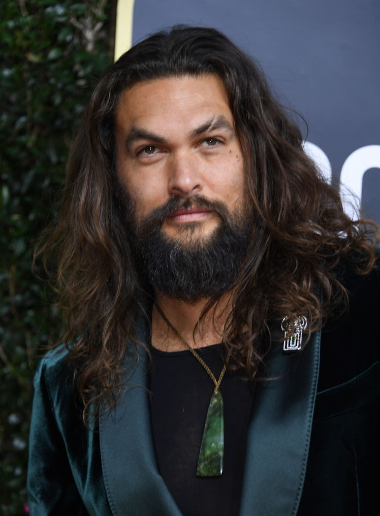 Jason Momoa's hair evolution includes red, curly hair as seen when Jason Momoa arrived for the 77th ...