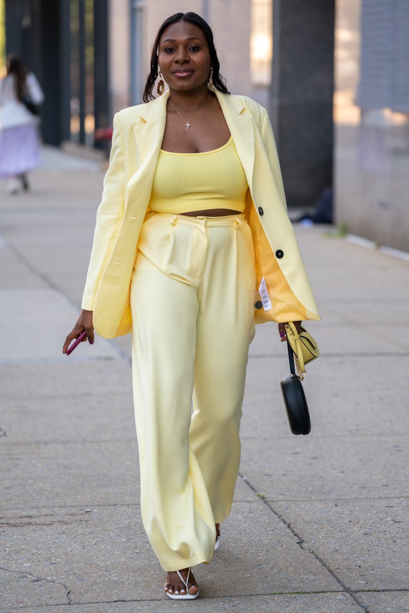 Bessem Ebott in a yellow suit at New York Fashion Week.