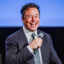 Tesla CEO Elon Musk smiles as he addresses guests at the Offshore Northern Seas 2022 (ONS) meeting i...