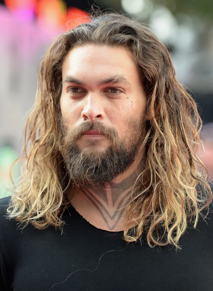 Jason Momoa's Hair Evolution Includes Short Hair, A Shaved Head, & Locs