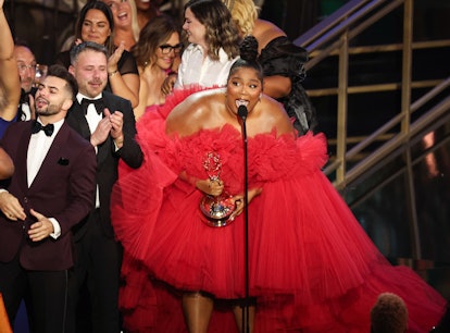 LOS ANGELES, CA - September 12, 2022 -  US singer-songwriter Lizzo (R) accepts the award for Outstan...