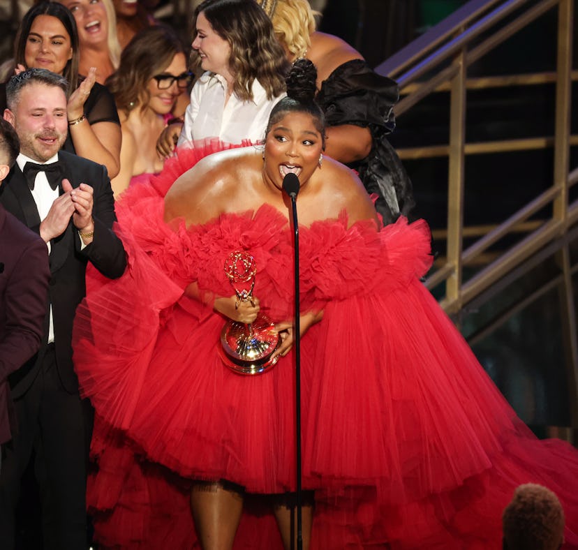 LOS ANGELES, CA - September 12, 2022 -  US singer-songwriter Lizzo (R) accepts the award for Outstan...