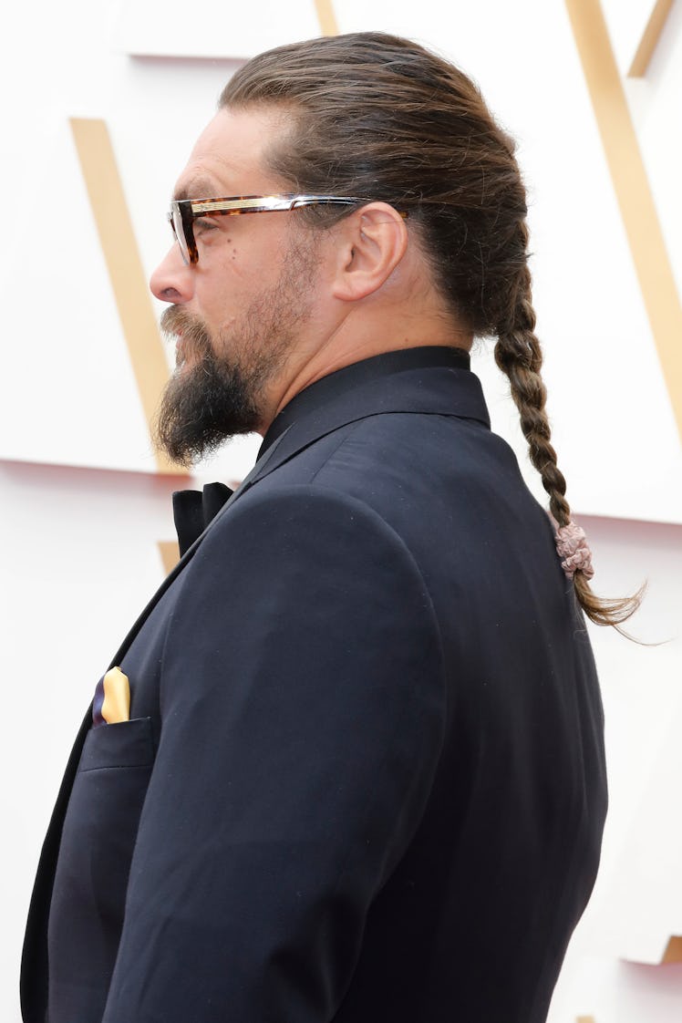 Jason Momoa's hair evolution includes a french braid as seen when Jason Momoa arrived on the red car...