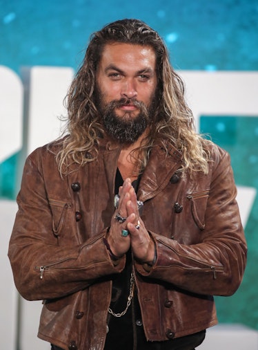 Jason Momoa's hair evolution includes beachy wave as when Jason Momoa attended the 'Justice League' ...