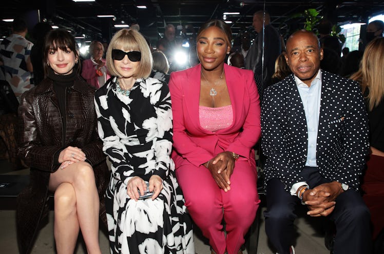 Anne Hathaway, Anna Wintour, Serena Williams, and Eric Adams seated together at the Michael Kors Spr...