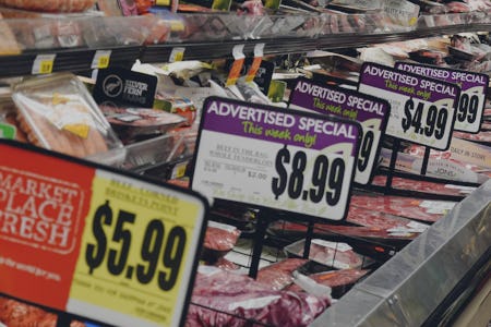 Groceries on sale at a grocery store, mostly meats