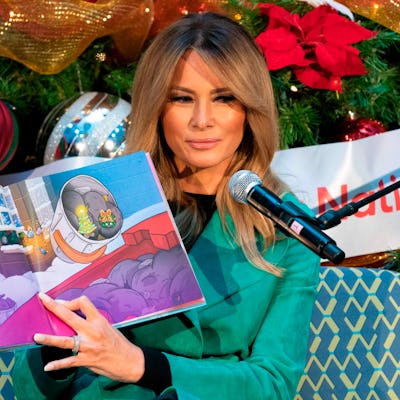 First lady Melania Trump reads a Christmas book to children who are patients at Children's National ...