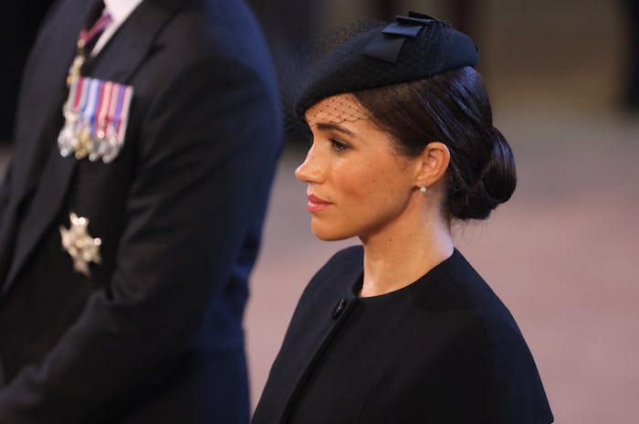 LONDON, ENGLAND - SEPTEMBER 14: Meghan, Duchess of Sussex looks on as the coffin of Queen Elizabet...