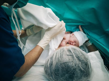 How To Keep Your C-Section Incision Dry, According To OB-GYNs