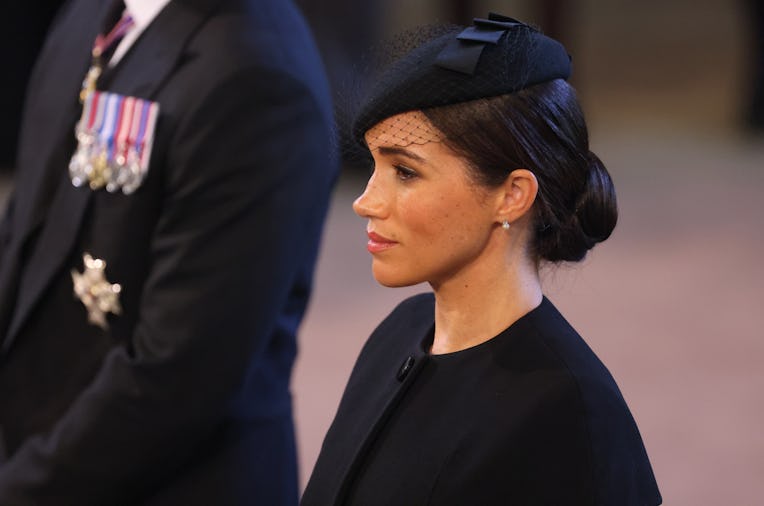 LONDON, ENGLAND - SEPTEMBER 14: Meghan, Duchess of Sussex looks on as the coffin of Queen Elizabet...