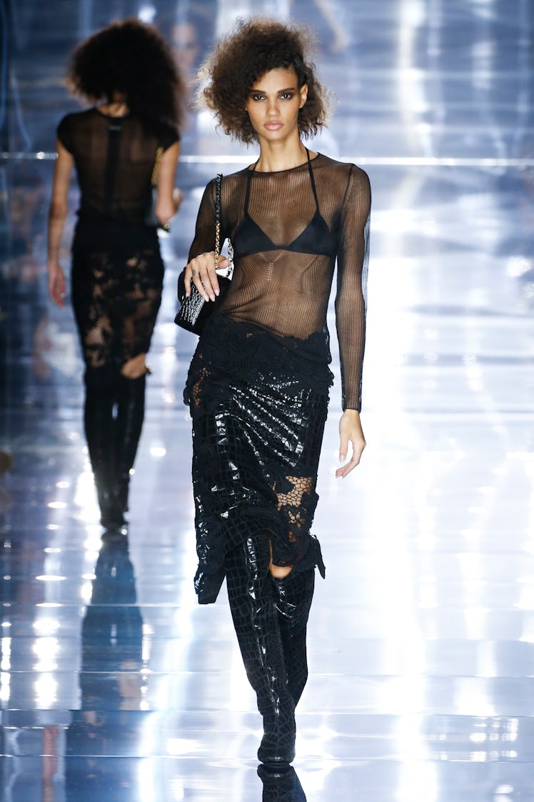 NEW-YORK, USA - SEPTEMBER 14: A model walks the runway during the Tom Ford Ready to Wear Spring/Summ...