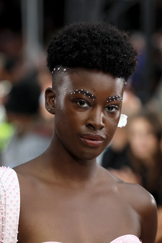 A model with grown-out brows walks the runway for Deus Ex Machina during Harlem's Fashion Row 15th A...