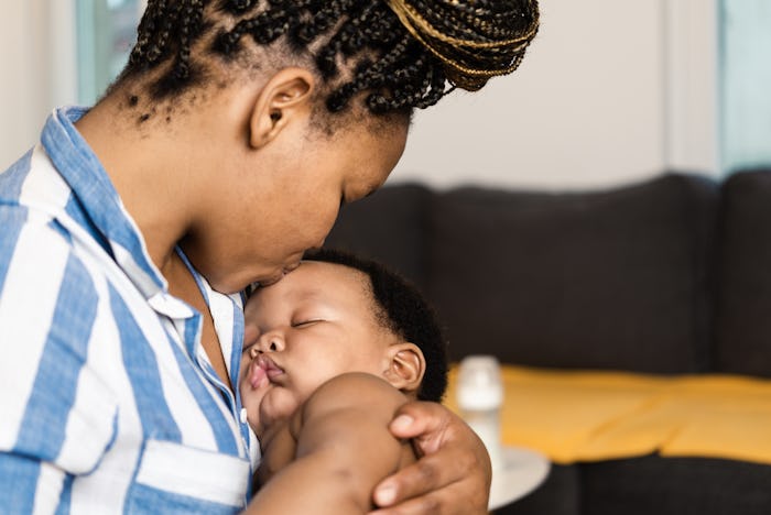 can babies sleep on their stomach on your chest? experts weigh in