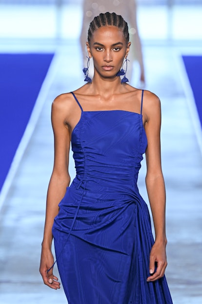 A model with grown out eyebrows walks the runway during the Jason Wu Ready to Wear Spring/Summer 202...