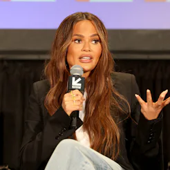 AUSTIN, TEXAS - MARCH 12: Chrissy Teigen speaks onstage at 'Examining The Way Down: God, Greed, and ...