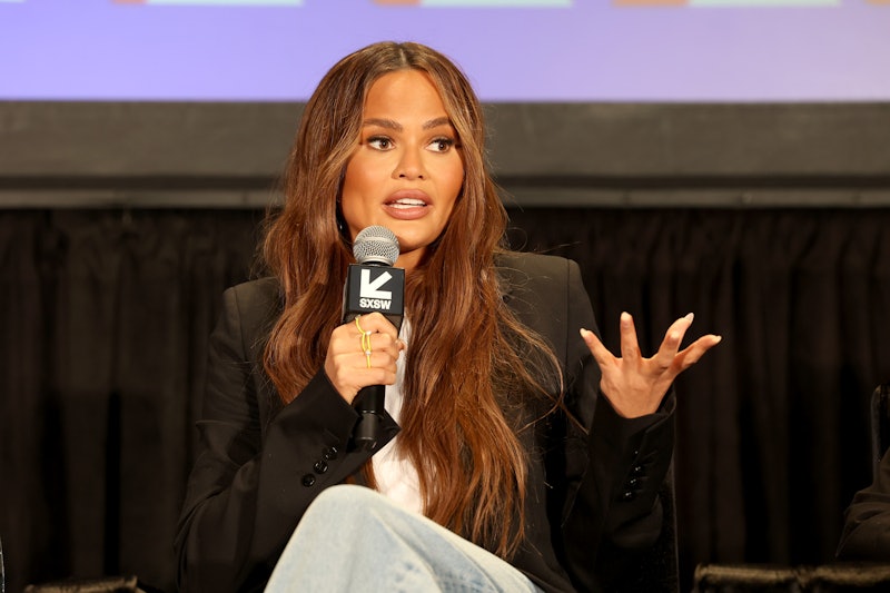 AUSTIN, TEXAS - MARCH 12: Chrissy Teigen speaks onstage at 'Examining The Way Down: God, Greed, and ...
