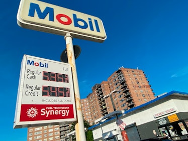 Mobil gas station sign showing high gas prices, near Grand Central Parkway, Flushing, Queens, New Yo...