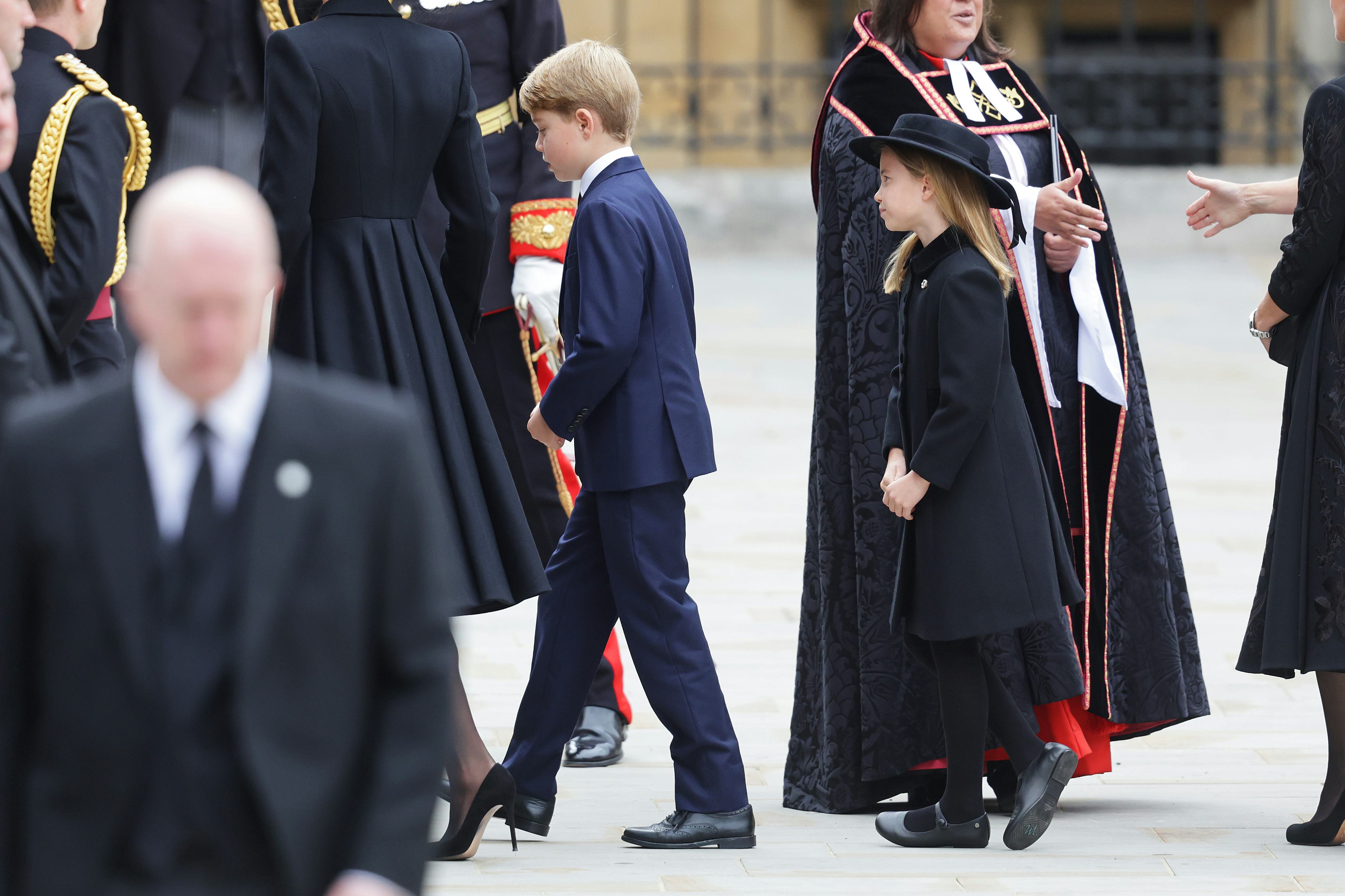 Prince George of Wales and Princess Charlotte of Wales arrive at Westminster Abbey