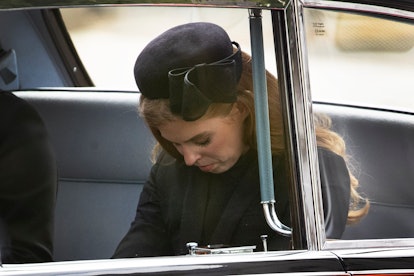 Princess Beatrice of York looks emotional as she follows the cortège of the late Queen Elizabeth II.