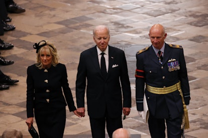 LONDON, ENGLAND - SEPTEMBER 19: US President Joe Biden (centre) and First Lady Jill Biden arrive at ...