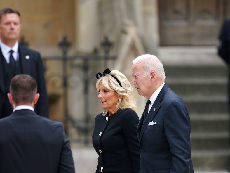 US President Joe Biden accompanied by the First Lady Jill Biden arriving at the State Funeral of Que...