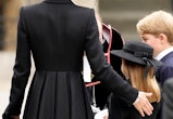 Princess Kate and her daughter Princess Charlotte, 7, wear matching dresses to the Queen's funeral.