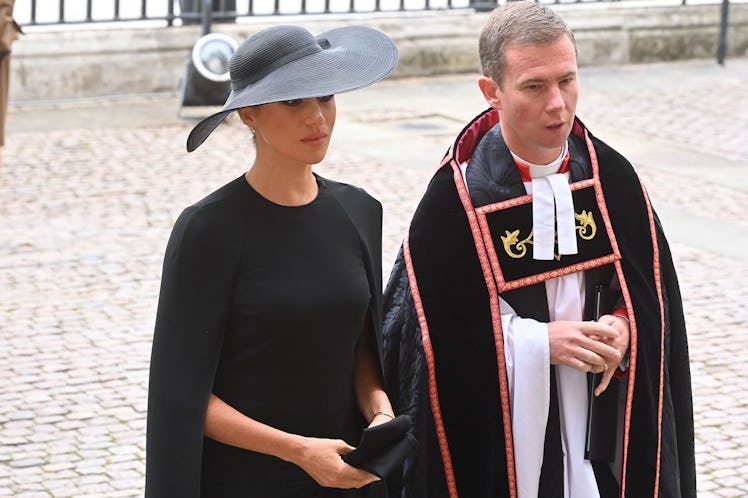 These photos of Meghan Markle and Prince Harry at Queen Elizabeth's funeral are touching.