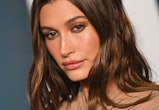 Hailey Bieber is a fan of overlining her lips. Here, a makeup artist who's worked with the model bre...