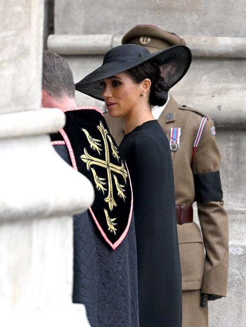 Meghan Markle, Duchess of Sussex arrives at Queen Elizabeth's funeral at Westminster Abbey.