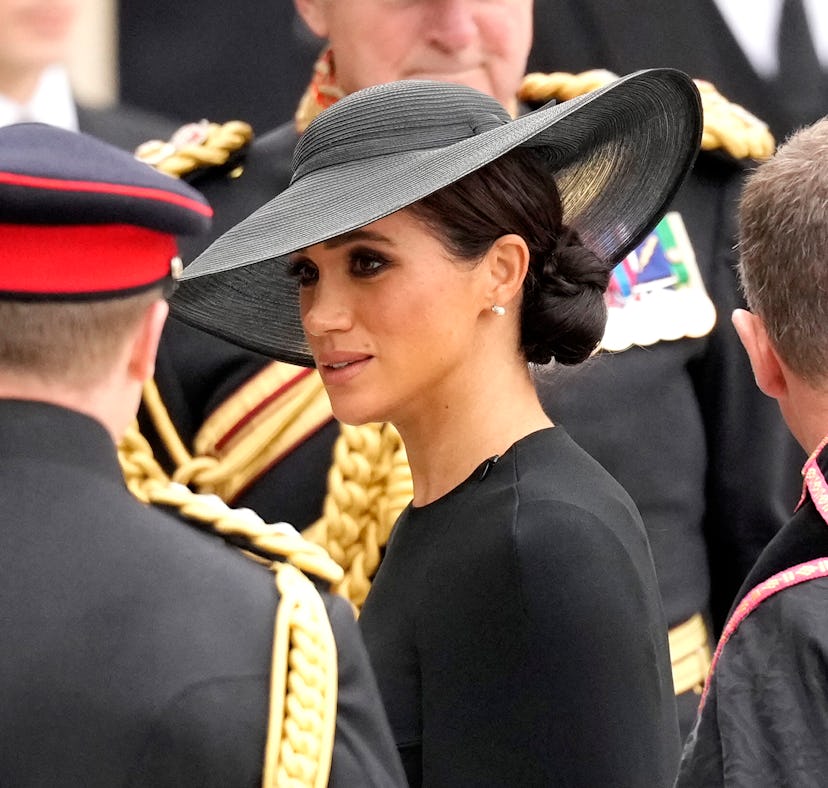 These photos of Meghan Markle and Prince Harry at Queen Elizabeth's funeral are touching.