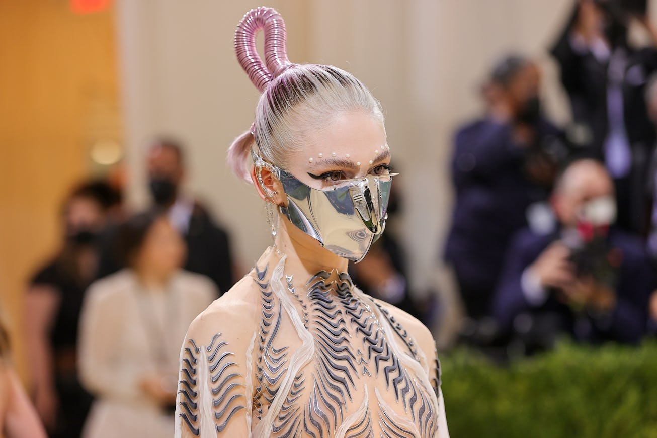 NEW YORK, NEW YORK - SEPTEMBER 13: Grimes attends The 2021 Met Gala Celebrating In America: A Lexico...