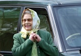 WINDSOR, UNITED KINGDOM - MAY 17:  Queen Elizabeth II Relaxed And Laughing In Headscarf And Casual C...