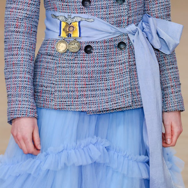 Detail of an accessory carried by a model walking the runway during the Bora Aksu show during London...