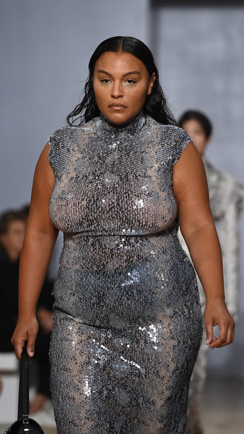 LONDON, ENGLAND - SEPTEMBER 18: A model walks the runway during the 16Arlington show during London F...