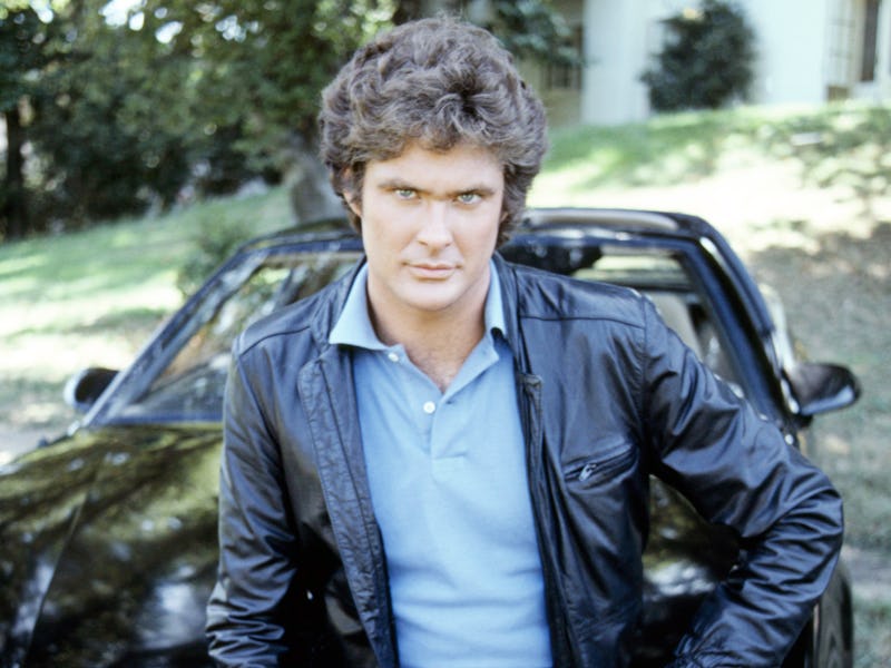 American actor David Hasselhoff, star of the TV show 'Knight Rider' sitting on KITT, the artificiall...