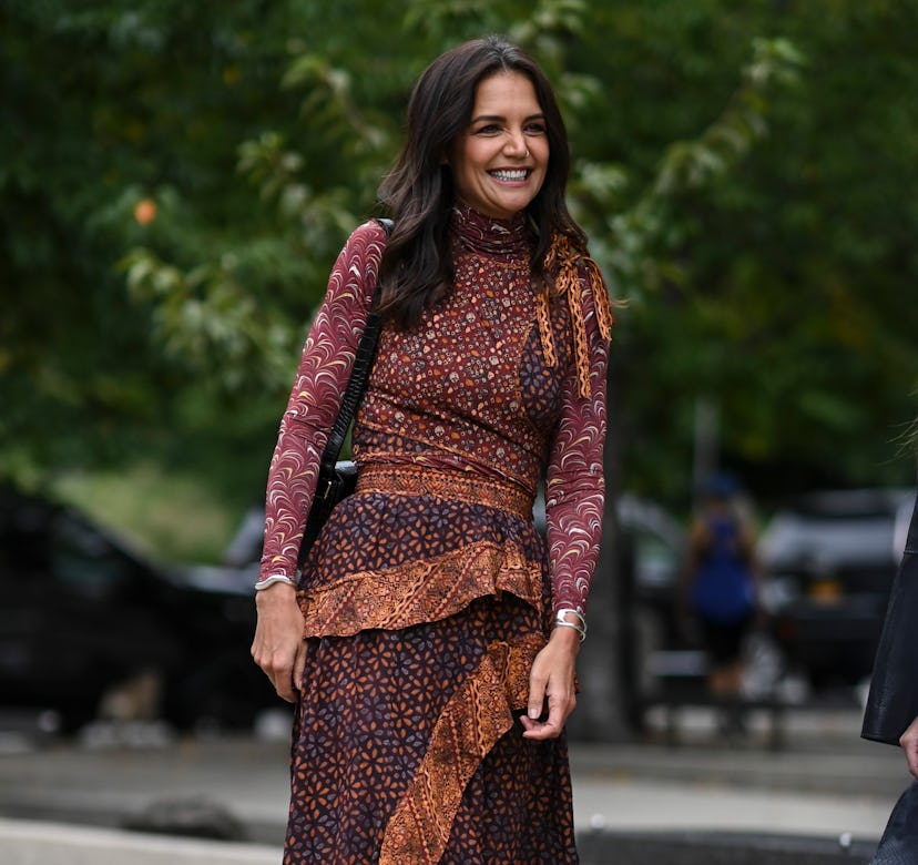Katie Holmes is seen wearing a brown Ulla Johnson dress