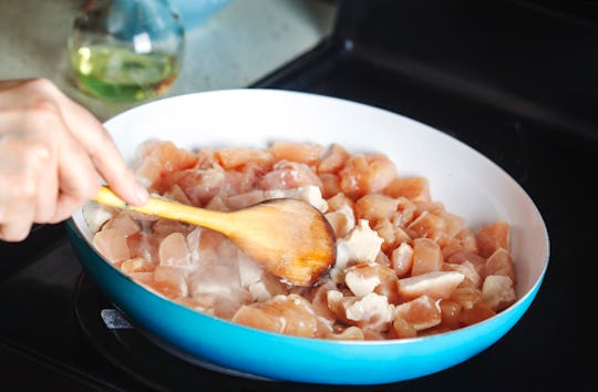 Preparing for chicken masala dish. Home cooking.