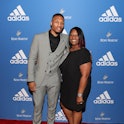 Damian Lillard poses with his mom Gina Johnson at the Adidas Basketball Black Tie Party Presented by...