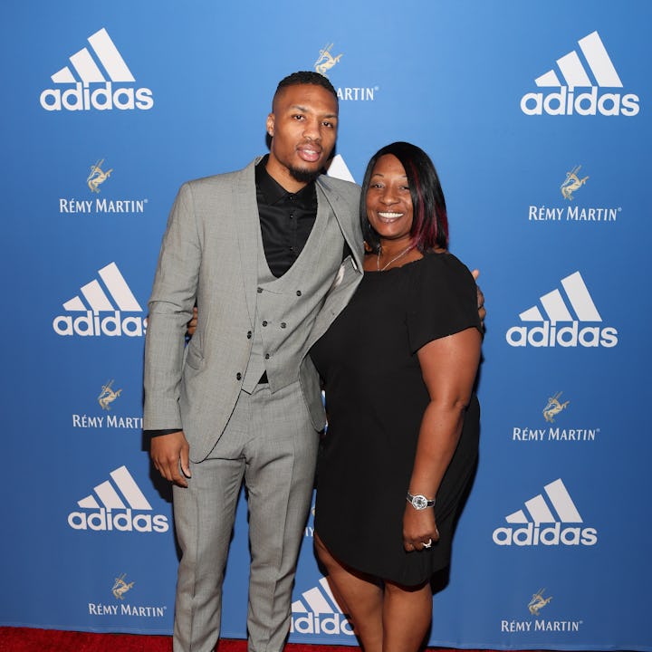 Damian Lillard poses with his mom Gina Johnson at the Adidas Basketball Black Tie Party Presented by...