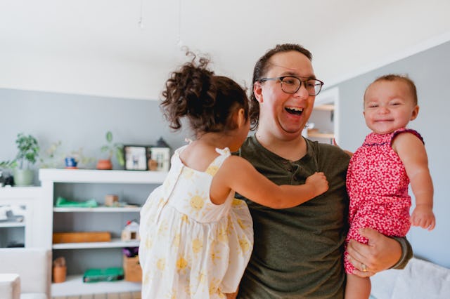 A dad playing with his two daughters. A new study coming out of Tulane University makes the claim th...