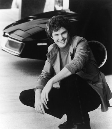 American actor and singer David Hasselhoff poses next to the computerized car, K.I.T.T., in a promot...