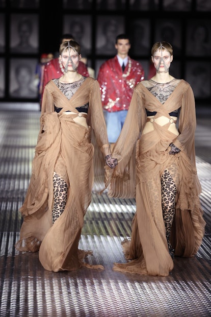 Models walk the runway of the Gucci Twinsburg Show during Milan Fashion Week Spring/Summer 2023 